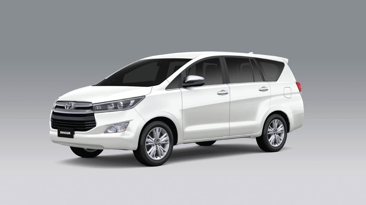 A photo of a Toyota Innova Crysta - White MUV.